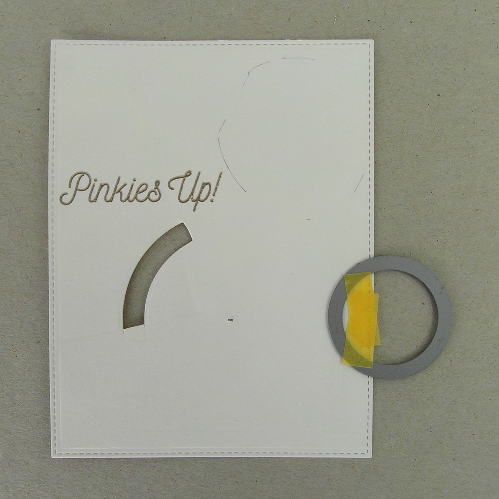 Pinkies up embossed in platinum embossing ink.