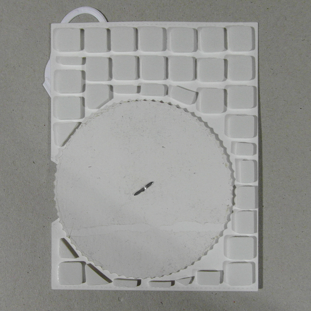 The back of the cardpanel covered with foam adhesive.