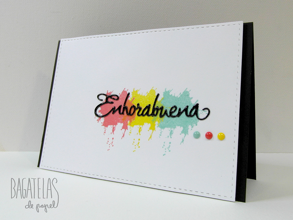 A card with three colored embossing by Laura Dovalo.