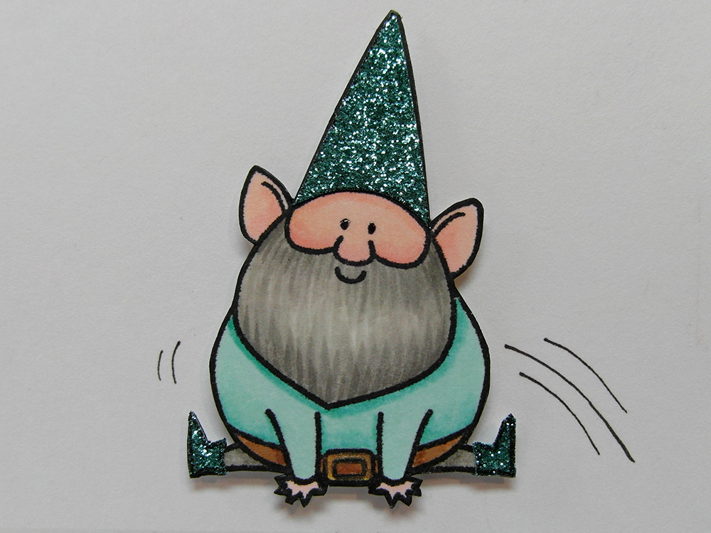 Close up of a gnome stamp colored with Copic markers.