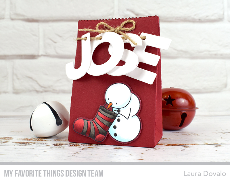Personalized Christmas treat bag in red and white.