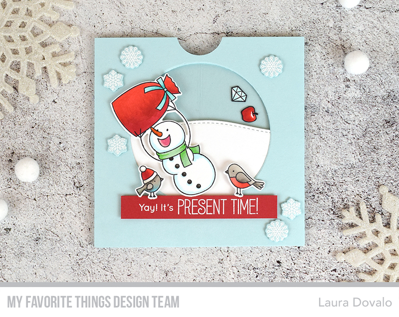 Cenital view of interactive Christmas volvelle card.