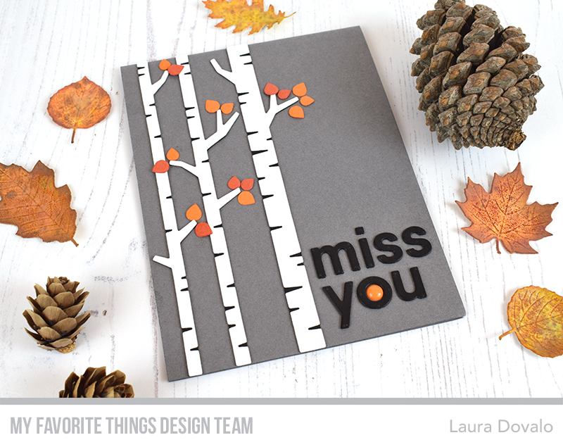 Graphic card with black and white birch trees.