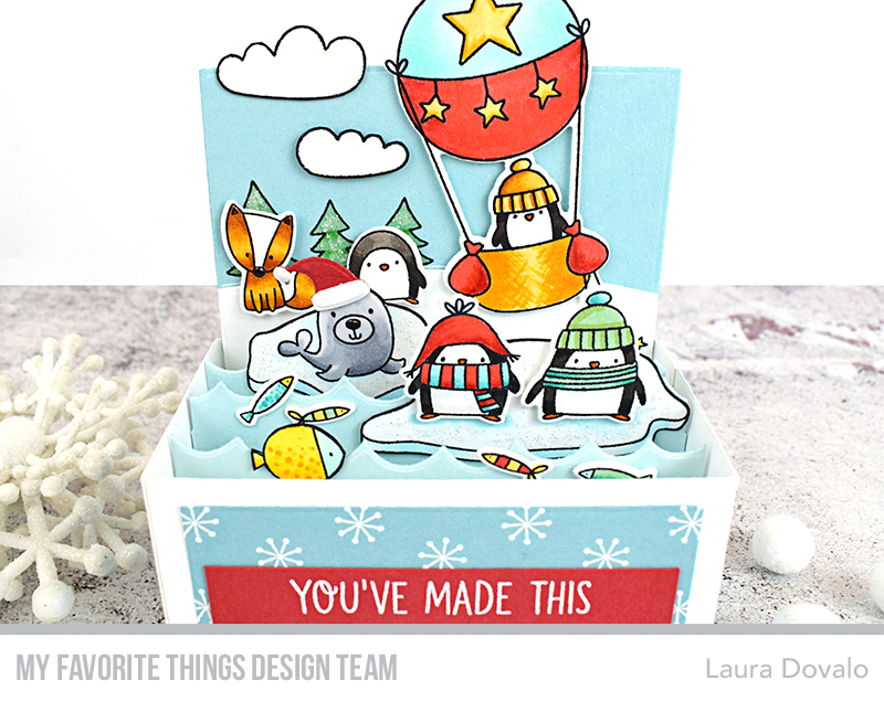 Close up of Christmas card in a box.