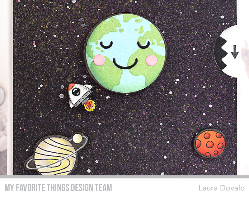 Close up of interactive earth globe and orbiting space shuttle card.