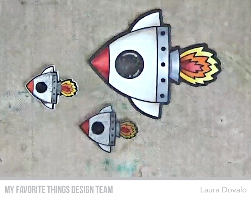 Space shuttles made with MFT stamp and shrink plastic.