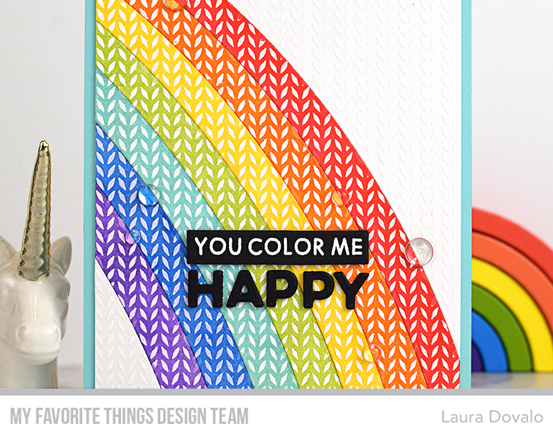 Close up of CAS card with textured rainbow.
