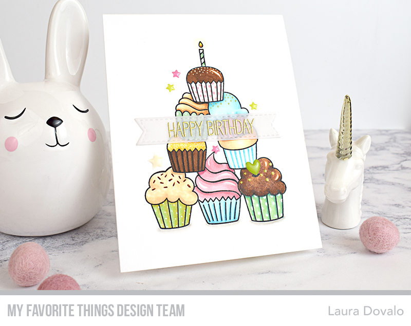 Handmade greeting card with colorful cupcakes.