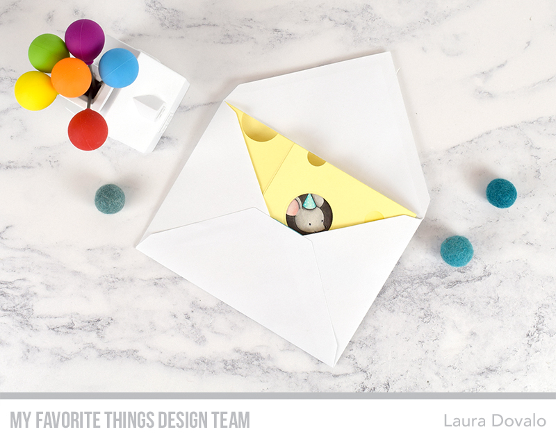 Cheese shaped shadow box card inside of white envelope.