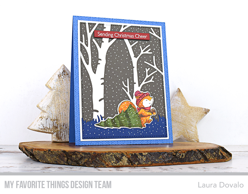Christmas card with trees in blues and gray.