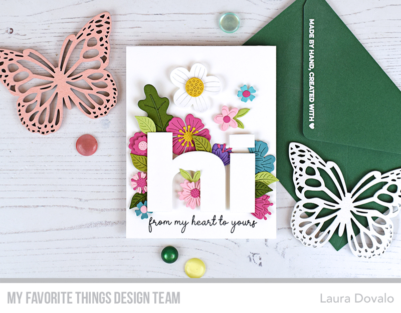 Cenital view of CAS card with flowers.
