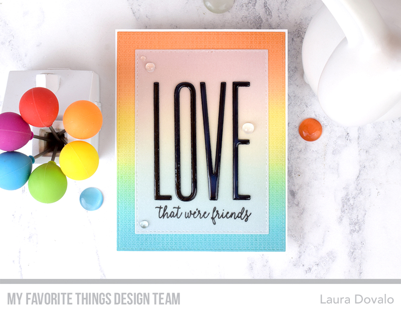 Cenital view of card with embossed background and XL Love sentiment.