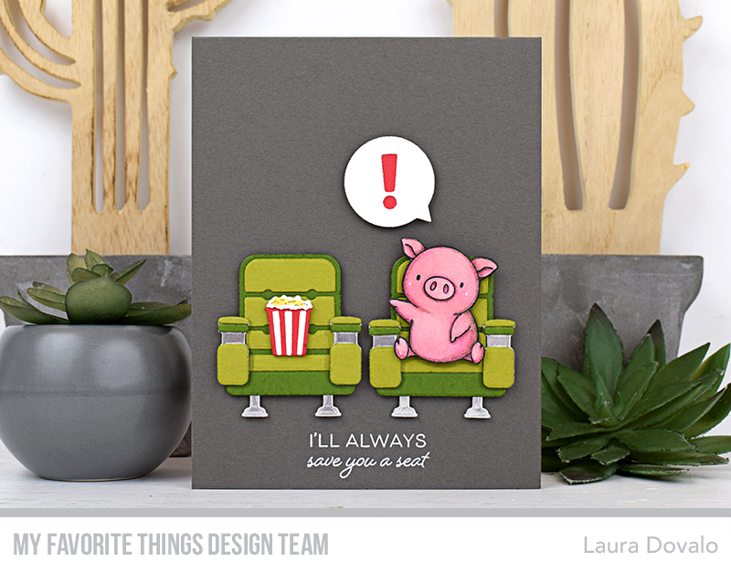 Close up of card with piggy and popcorn.