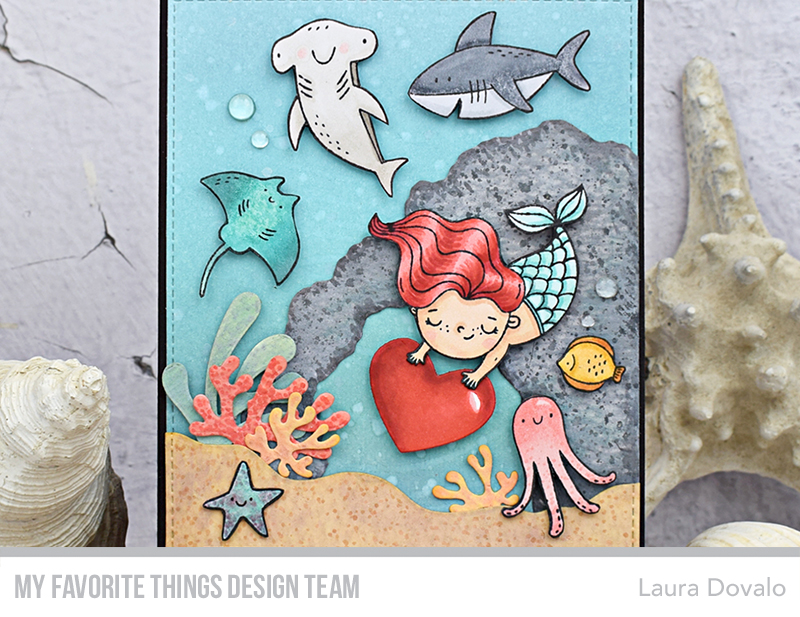Close up of card with underwater scene.