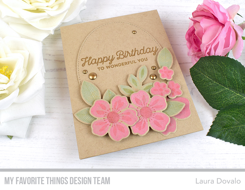 Kraft colored card with oval and flowers stamped with Distress Oxide Inks.