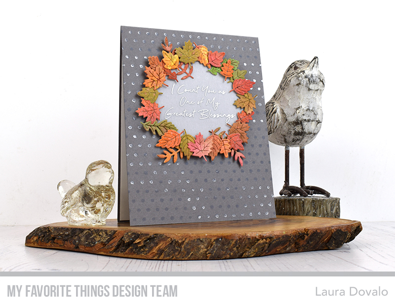 Greeting card with beautiful wreath of leaves.