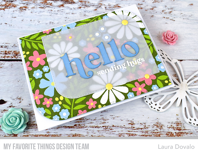 Close up of floral card with embossed flowers.