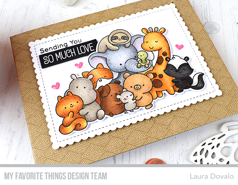 Close up of card with pile of animals.