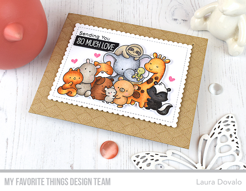 Card in kraft and white with pile of animals colored with Copic markers by Laura Dovalo.
