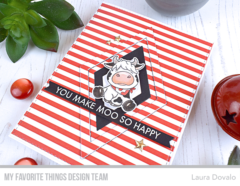 Close up of colorful graphic cow card.