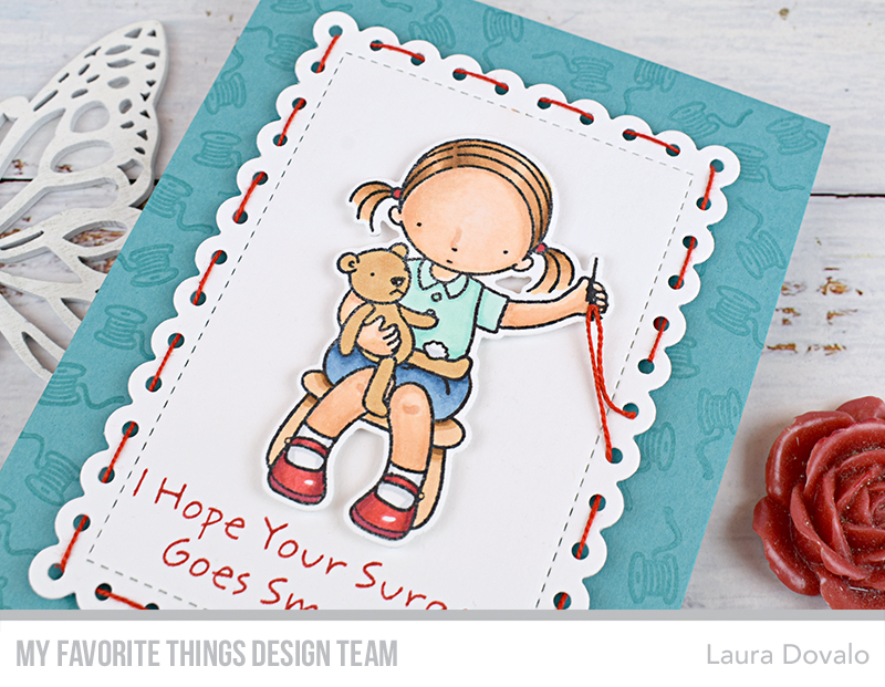 Close up of get well card with red stitches.