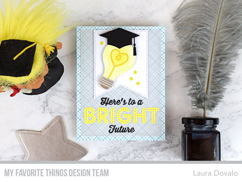 Cenital view of graduation card with light bulb.