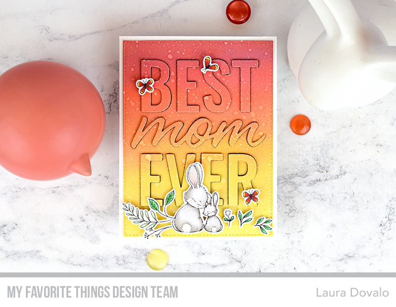 Cenital view of greeting card with sweet bunnies and camouflaged sentiment.