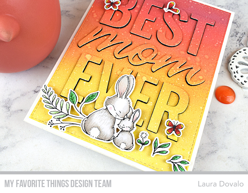 Close up of colorful greeting card with sweet bunnies.
